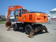 Колесный экскаватор   HITACHI ZX 210 W Год выпуска:2006